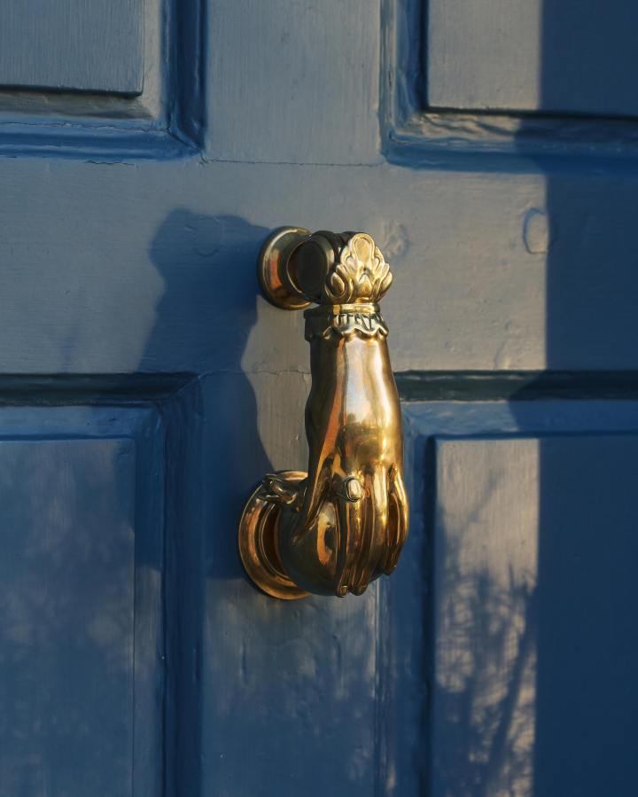 The Weaver’s Hand Door Knocker